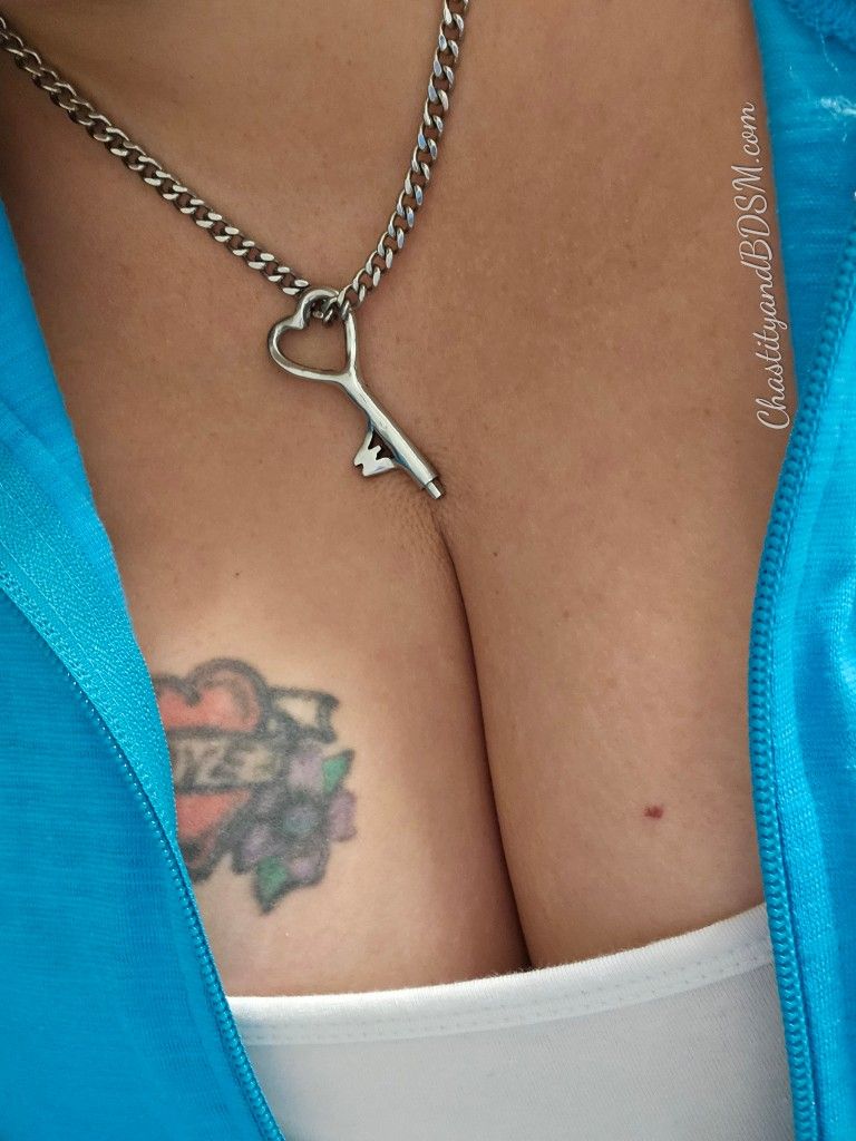 The Keyholder's key around her neck and her lovely cleavage. 