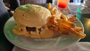 Beer Cheese covered burger at an Irish pub